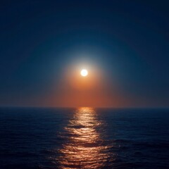 Obraz premium glowing sun above blue horizon