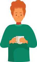Redhead man wearing green sweater warming his hands on a mug of warm beverage