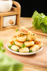 Shengjian Pan-Fried Pork Buns Chinese Breakfast Dumplings on Wooden Table