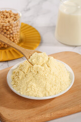 Soy flour powder with soybeans and soy milk - plant-based protein ingredient for healthy cooking