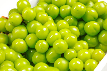 Fresh Green Grapes in White Box with Natural Sunshine Lighting