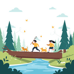 Children with dogs exploring a forest crossing a fallen log over a stream