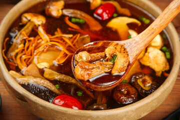 Colorful Mixed Mushroom Soup with Vegetables in Wooden Bowl - Healthy Comfort Food Essentials