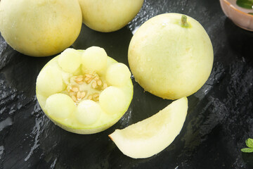 Fresh Yunnan Cantaloupe Melons Collection - Whole and Sliced Yellow Tulip Variety Ready for Picking