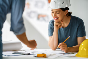 Team of architects working on plans