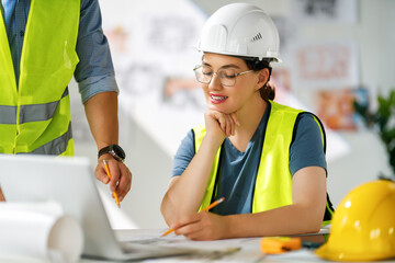 Team of architects working on plans