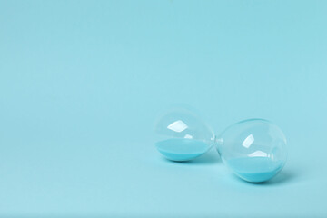 hourglass on a blue background
