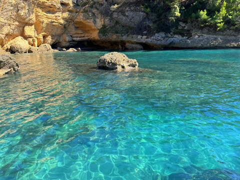 Amazing sea bay with turquoise water and rocks of Mediterranean coast.