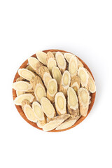 Astragalus Root Slices in Wooden Bowl on White Background - Traditional Chinese Medicine Herb