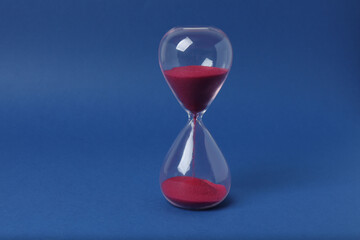 hourglass on a blue background

