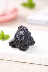Xinjiang Dried Prunes Air-Dried Healthy Snack on White Marble Board
