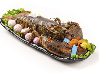 Fresh Australian Lobster with Vegetables on Black Platter White Background