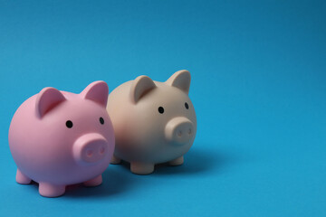 piggy bank, money dollars euros on a blue background
