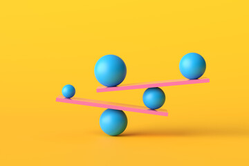 Balancing balls of different sizes on pink seesaws creating equilibrium