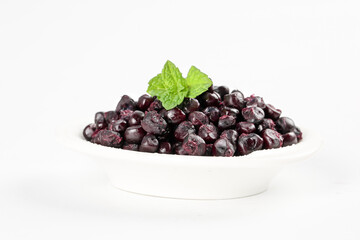 Black Glutinous Rice Corn with Mint in White Bowl on White Background