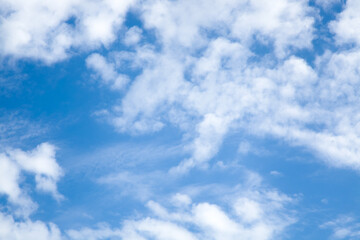 Obraz premium Blue Sky with White Fluffy Clouds Natural Background