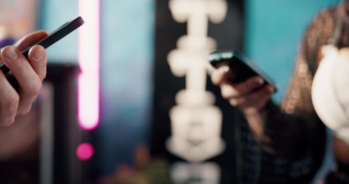 Phone, pos machine and payment with hands of people in tattoo parlor for online banking, nfc and scan. Digital transaction, point of sale and cashier with customer for checkout app, retail and tap