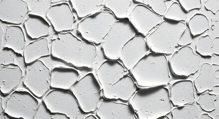 Close up of a white textured surface with irregular shapes and patterns for backgrounds
