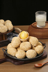 Golden Egg Yolk Dessert Balls Chinese Sweet Treats on Cast Iron Plate