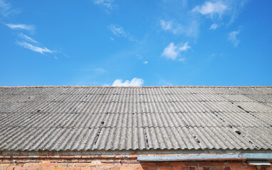 Photo of a roof made of carcinogenic asbestos tiles.