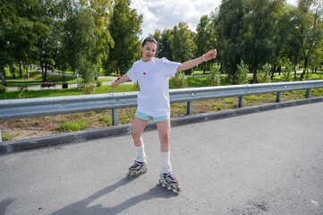 Caucasian woman in shorts roller skating. 
