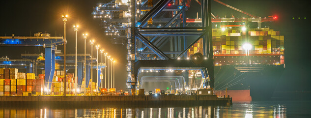 Container terminal at the seaport at night