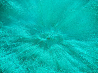 Abstract image in aqua color of sand at the bottom of the sea.