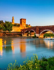 Obraz premium Ancient bridge over tranquil river