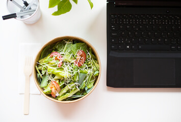 Mindful Eating Concept with Salad on Work Desk