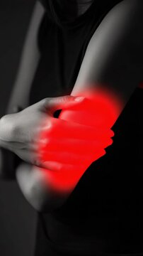 Painful joint with red heat sensation indicating discomfort and suffering in the limb. Vertical video.