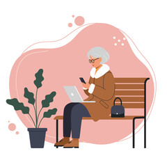 Senior woman using a laptop and smartphone outdoors, demonstrating digital literacy and connection. Represents active aging, technology, and modern lifestyle.