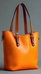 Bright orange leather tote bag
