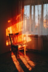 Warm sunset light streams through a window, illuminating a wooden chair in a room