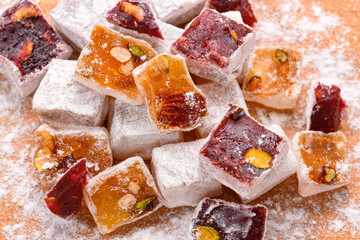 Sweet food Turkish delight, assorted rahat locum in form of cubes with nuts and powdered sugar, traditional food