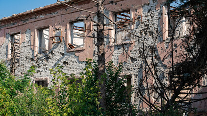 ruined street and destroyed houses in Kiev war in Ukraine