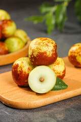 Fresh Sweet Jujube Fruits on Wooden Board - Healthy Organic Snack Food
