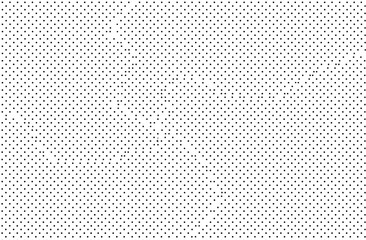 Abstract pattern of tiny dark squares on white background