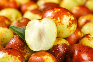 Fresh Jujube Fruits Cut in Half Showing Sweet White Flesh - Winter Harvest of Crunchy Asian Dates