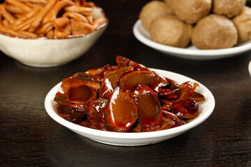 Traditional Chinese Preserved Vegetables Side Dish with Steamed Buns and Noodles
