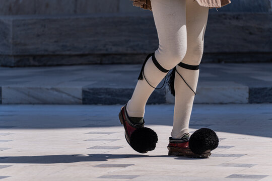 Traditional evzone footwear during a ceremonial march