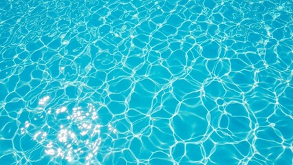 Obraz premium Sparkling blue water surface with sunlit ripples