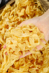 Dried Soybean Skins from Shandong Heilongjiang China - Traditional Asian Protein Ingredient in Hand