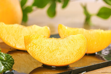 Fresh Golden Orange Slices with Mint Leaves on Slate Board - Healthy Citrus Fruit Food Photography