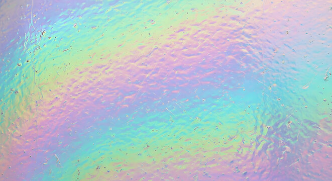 Iridescent Surface With Colorful Hues And Rippled Texture In Soft Light