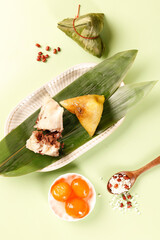 Dragon Boat Festival Zongzi Dumplings with Meat and Eight Treasures on Bamboo Leaves Display
