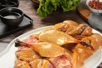 Whole Roasted Duck with Golden Crispy Skin on White Plate - Traditional Farmers Market Style Cooking