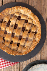 Traditional Pastafrola pie with guava filling, also known as Cuban pae on wooden table