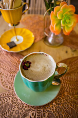 Cozy coffee moment with beautiful porcelain cups. Drink in a beautiful cup