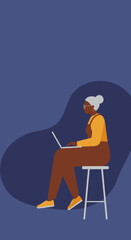 Elderly African American woman sitting on a stool, intently using a laptop. Represents modern seniors embracing technology, learning, and digital connectivity.