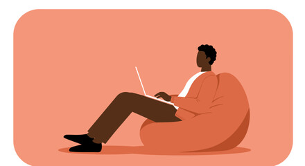 Person sitting comfortably on a bean bag chair, working on a laptop. Represents remote work, casual office, or relaxed online learning, embodying modern lifestyle and digital connectivity.